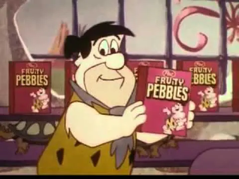 Fred Flintstone holding Fruity PEBBLES cereal box
